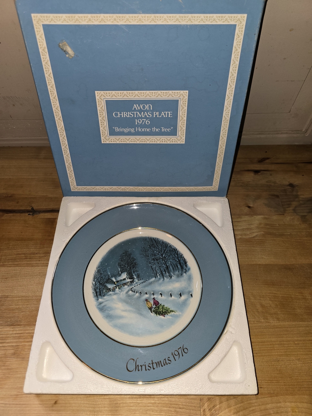 Avon Blue Christmas Plate 1976 - Winter Scene "Bringing Home the Tree"